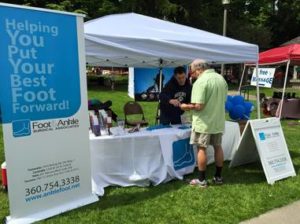 FASA Table at running event educating public